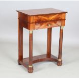 A 20th century Empire style mahogany work/side table, the hinged top revealing a fitted interior