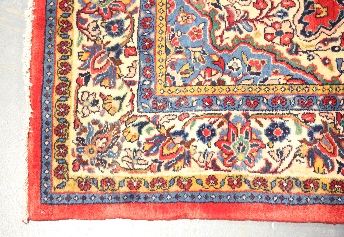 A Sarough rug, Central Persia, mid-20th century, the red field with a shaped medallion, within an - Image 3 of 5