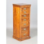 An Edwardian walnut Wellington chest of seven drawers, height 111cm, width 42cm, depth 42cm (some