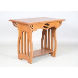 An early 20th century Arts and Crafts oak rectangular side table, probably Glasgow School, the