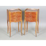 A pair of mid-20th century French kingwood bedside chests of three drawers with galleried quarter-