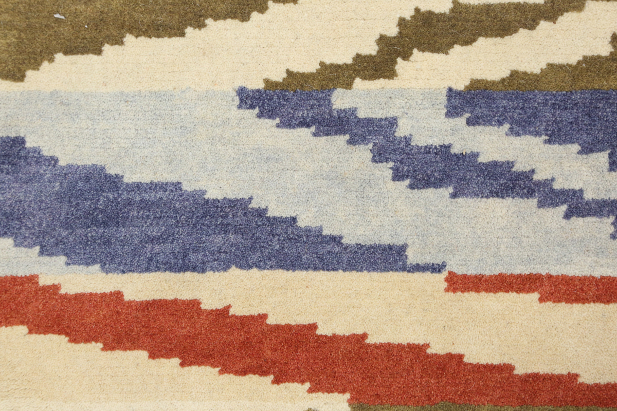 A contemporary design rug, modern, the ivory field with geometric polychrome bands, 180cm x 125cm. - Image 6 of 9