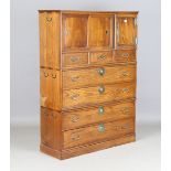 A 20th century Korean stained elm side cabinet, fitted with three doors above seven drawers,