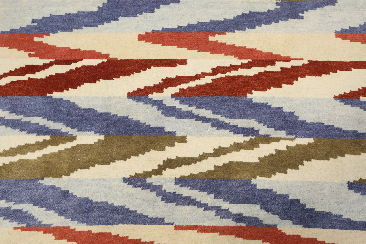 A contemporary design rug, modern, the ivory field with geometric polychrome bands, 180cm x 125cm. - Image 7 of 9