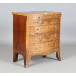 A small early 20th century George III style mahogany bowfront chest of four long drawers, fitted