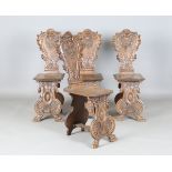 A set of four late 19th century French walnut sgabello chairs by Stefani & Volpi, Rue Notre-Dame,