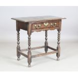 An early 20th century Queen Anne style oak side table with a crossbanded frieze drawer, height 71cm,