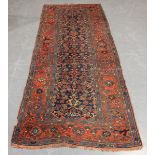 A Feraghan runner, North-west Persia, early 20th century, the midnight blue field with overall
