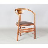 An Edwardian Arts and Crafts ash and satin birch elbow chair, attributed to Wylie & Lochhead and