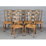 A set of six 20th century French oak and ash framed ladder back kitchen chairs, height 99cm, width