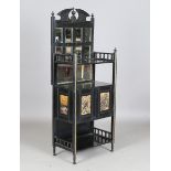 A late Victorian Aesthetic Movement ebonized side cabinet, in the manner of E.W. Godwin, the two