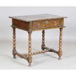 An early 18th century oak side table, fitted with a single drawer, on bobbin turned legs, height