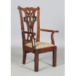 A George III mahogany child's chair, the carved splat back above a needlework drop-in seat, height