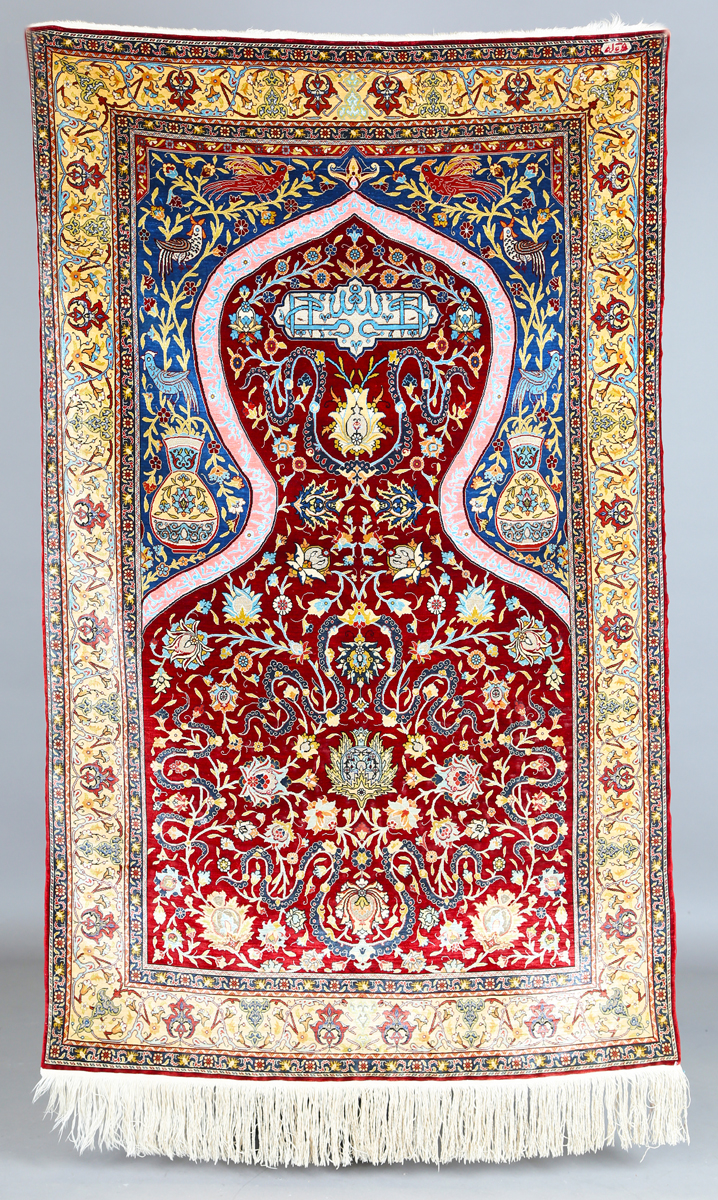 A fine Hereke silk and gilt metal thread prayer rug, Turkey, modern, the deep claret mihrab with
