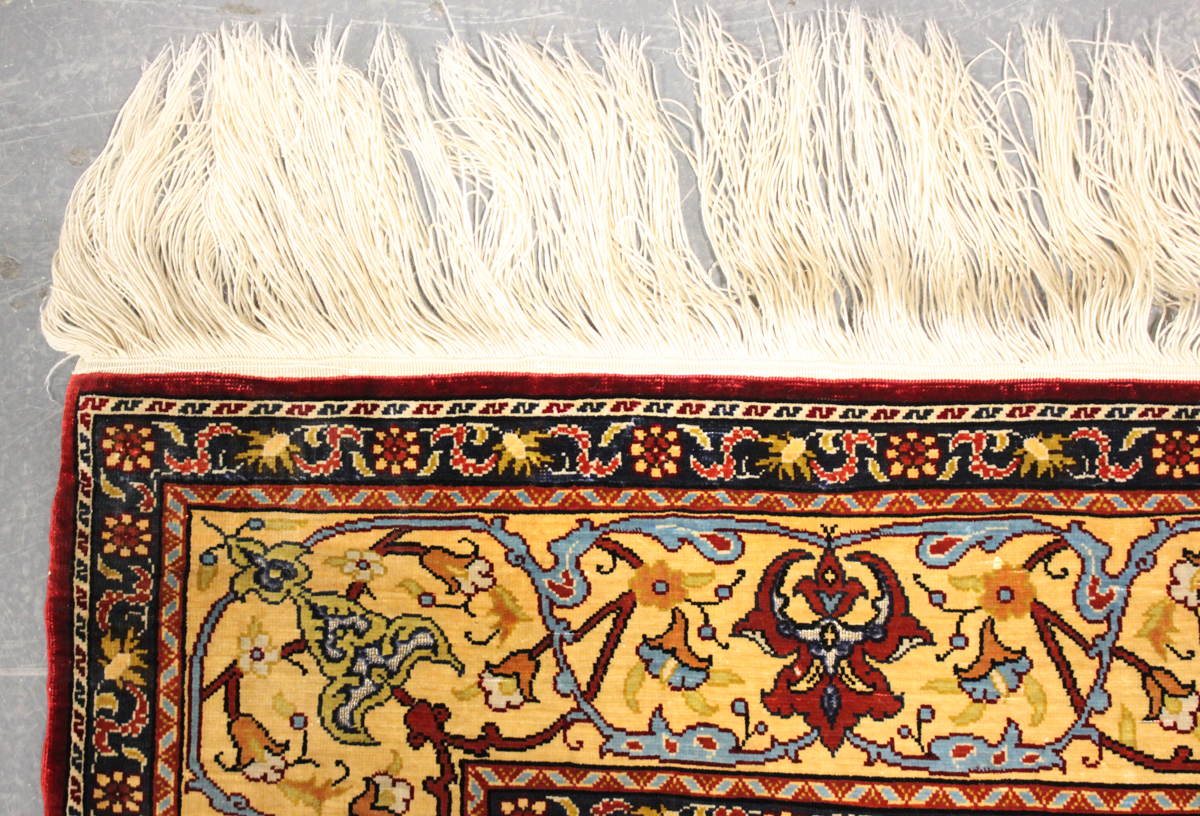 A fine Hereke silk and gilt metal thread prayer rug, Turkey, modern, the deep claret mihrab with - Image 18 of 23