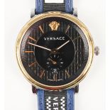 A Versace V-Circle gilt metal fronted and stainless steel backed gentleman's wristwatch, Ref. VEBQ14