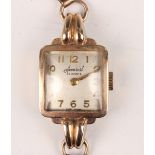 An Accurist 9ct gold square cased lady's wristwatch with signed jewelled movement, the signed