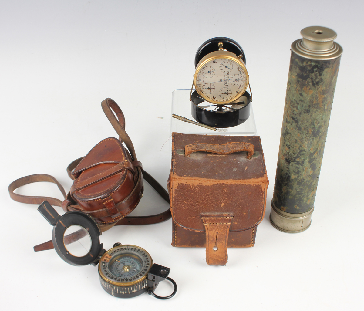 A mid-20th century gilt lacquered brass and black enamelled anemometer, the circular silvered dial