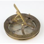 A 19th century brass equinoctial pocket sundial, the brass circular base with glazed silvered