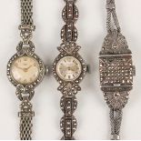 An Avia silver and marcasite lady's bracelet wristwatch, the signed circular silvered dial with gilt