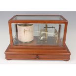 An early 20th century mahogany cased barograph with gilt brass mechanism and clockwork recording