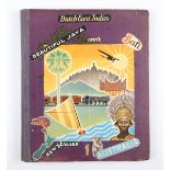 PHOTOGRAPHS & CUTTINGS. A scrapbook containing cuttings and photographs of Java, Bali, Australia and