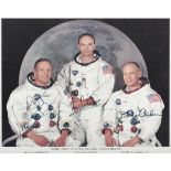 AUTOGRAPHS, MOON LANDING. A colour photograph signed by the crew of the Apollo 11 mission: Neil