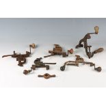 Five late 19th/early 20th century shotgun cartridge loading tools, each with desk-mounting vice-type