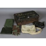 A collection of mid-20th century militaria, including a combat smock, dated '1965', and an R.E.M.