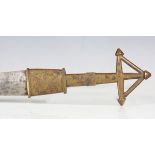 A North African arm or leg dagger with double-edged hammered shaped blade, blade length 34.5cm, cast