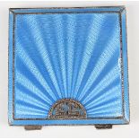 A George V silver and blue enamelled square compact, the front decorated in marcasite with