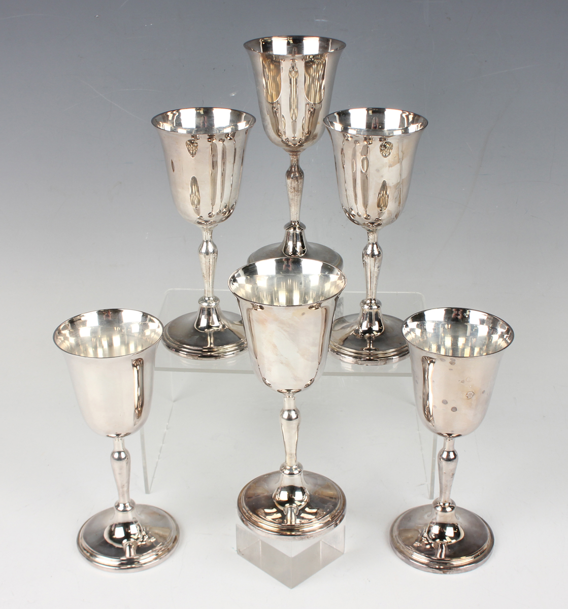 A set of six Elizabeth II Irish silver goblets, each with tapering circular bowl above a baluster