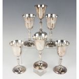 A set of six Elizabeth II Irish silver goblets, each with tapering circular bowl above a baluster