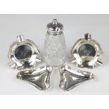 Two pairs of silver ashtrays, Birmingham 1906 and Chester 1905, total weight 174.3g, together with a