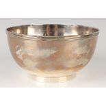 A George V silver circular bowl with reeded rim, on a circular foot, London 1911 by Holland,