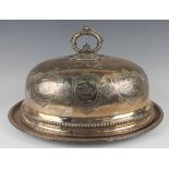 A Victorian plated meat dome with detachable scroll and beaded handle and oval meat dish, the dome