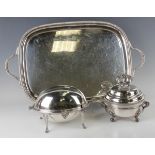 An early 20th century plated two-handled tray, length 67.5cm, together with a plated roll-over