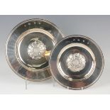 An Elizabeth II silver circular Tudor Rose dish, London 1967, diameter 30.5cm, and another similar