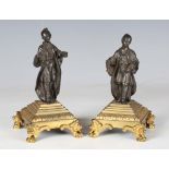 A pair of 19th century brown patinated and gilt bronze chinoiserie figures, each standing male