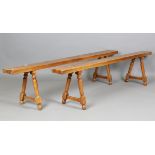 A pair of late 19th century French provincial cherry farmhouse benches, height 48cm, width 201cm,