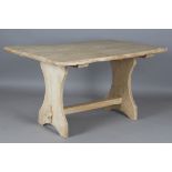 A 20th century bleached elm tavern style table, the single-piece top on trestle supports, height