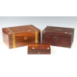 A Victorian walnut and brass bound writing slope, the hinged lid revealing a pair of inkwells, width