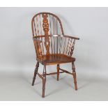 A Victorian ash and fruitwood hoop back Windsor armchair, height 106cm, width 61cm, depth 55cm (