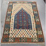 A Turkish kelhim prayer rug, mid-20th century, the blue mihrab with an ascending plant and ivory