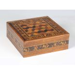 A late Victorian Tunbridge ware box, the geometric cube decorated lid above mosaic sides, width 15.