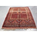 An Afghan Turkestan style ensi rug, mid-20th century, the pale plum field filled with stylized