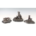 A modern cast bronze model group of a boxer dog and two puppies, height 24cm, together with two