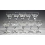 A set of ten large wine glasses, probably Stuart, the cut ogee bowls with baluster stems and conical