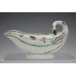 A Worcester cos leaf moulded sauceboat, circa 1755, with green enamelled detail and scattered