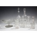 A set of four cut glass boat shaped salts with lemon squeezer bases, 19th century, height 7.3cm,